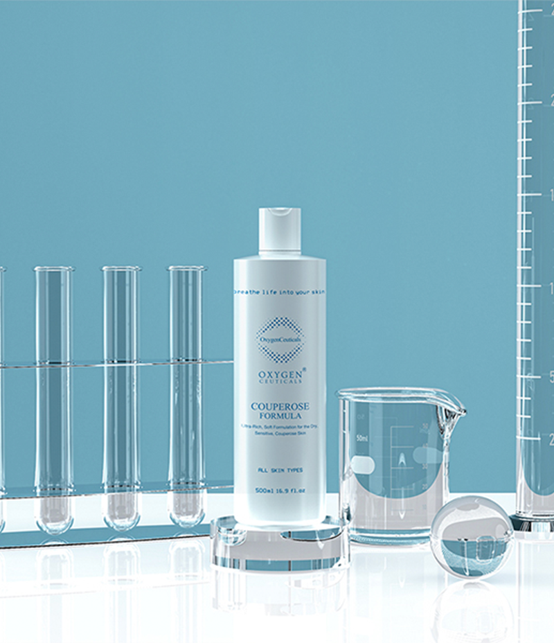 A bottle of Couperose Formula standing on a scientific white table with a blue backdrop.