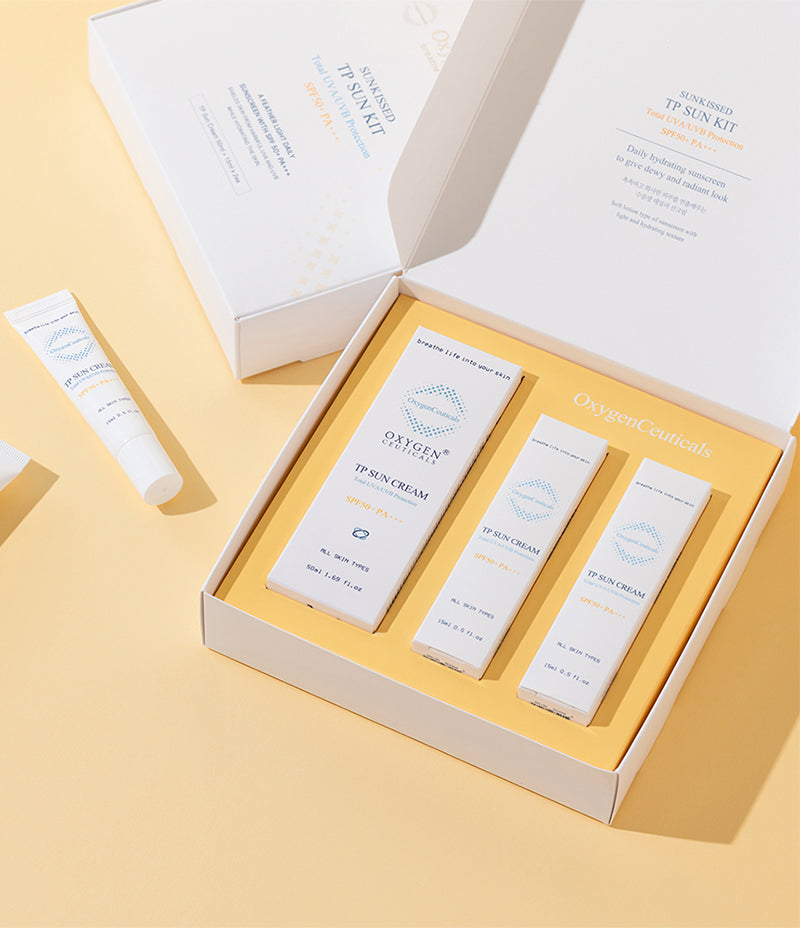 An image featuring the Sunkissed TP Sun Kit, a high-quality skincare product with SPF 50 PA+++, set against a soft orange background. 