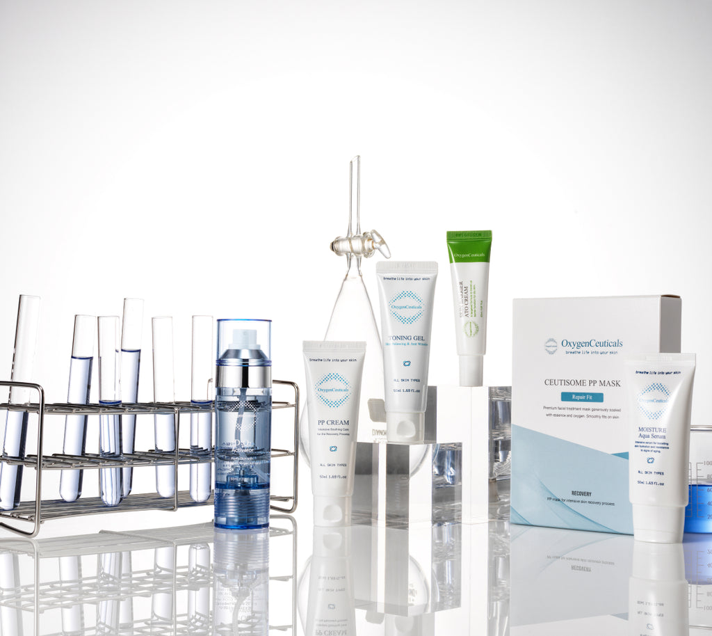 Image of OxygenCeuticals' best-selling post procedure products, PP Cream and D:O2 Activator, diligently arranged in a glossy lab for optimal view.
