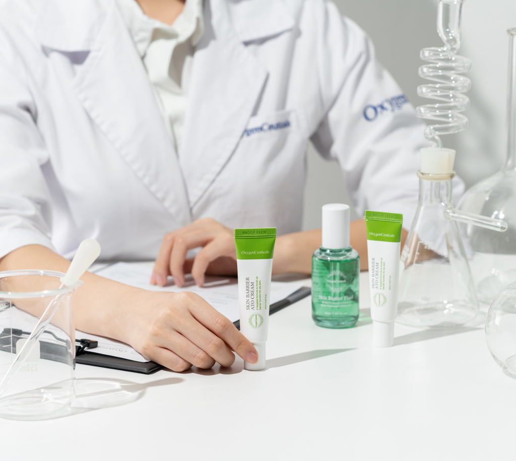 Dermatologist recommended Skin Barrier Ato Cream held by a professional in a lab coat, designed for treating atopic skin.