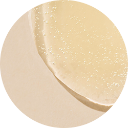 Closeup image of the ReGenon Serum lightweight serum texture perfect for aging and mature skin.
