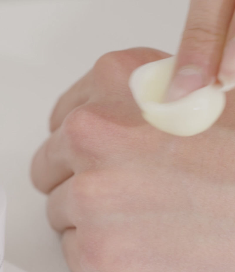 Brief video of the buttery, lightweight texture of the ReGenon Cream being applied to the back of a person's hand.