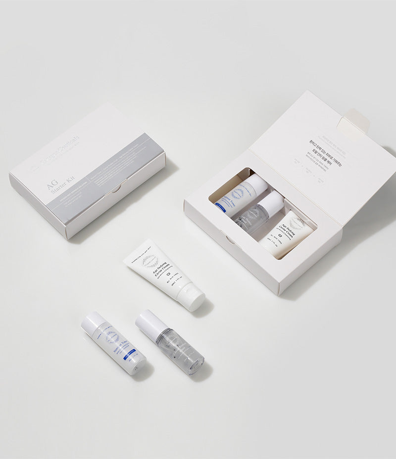 AG Starter Kit components including caviar infused serum and cream arranged on a white and gray background.