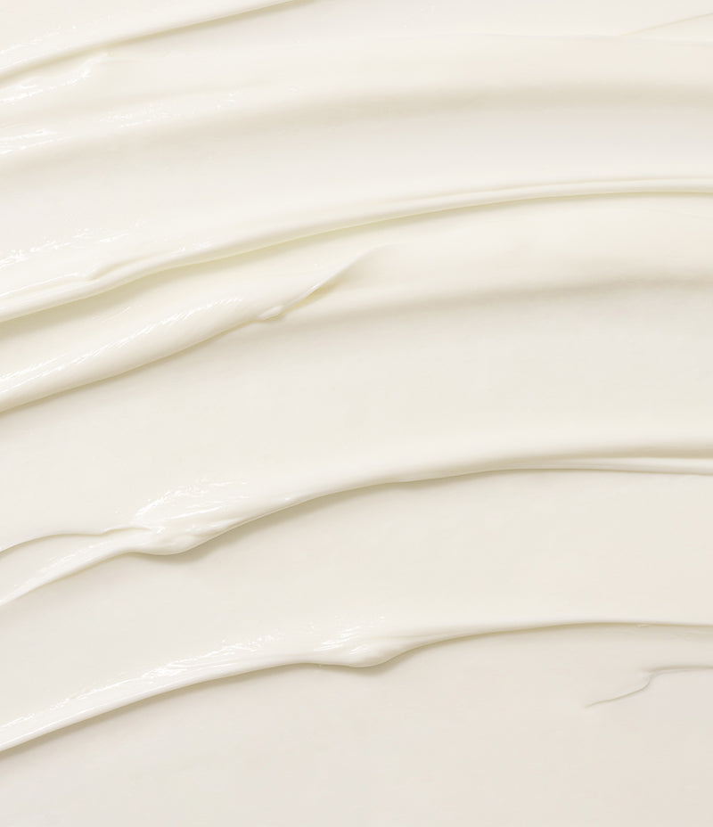 Close-up image showcasing the creamy texture of Vitamin C infused Active-C Massage Cream