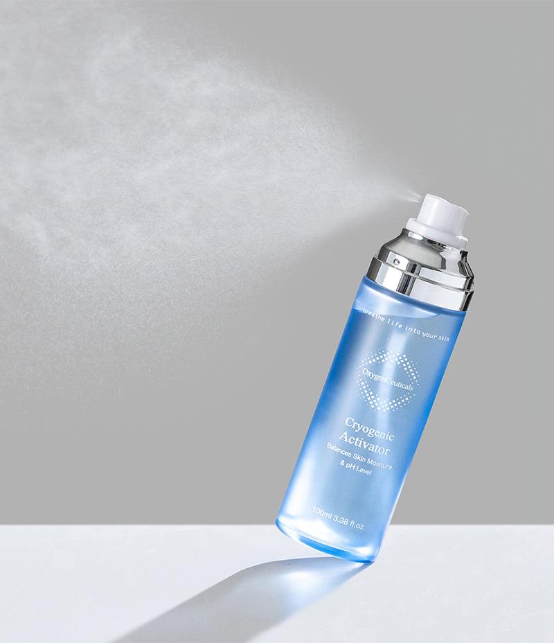 Bottle of Cryogenic Activator spraying a fine mist of desalinated deep sea water for cooling skincare.
