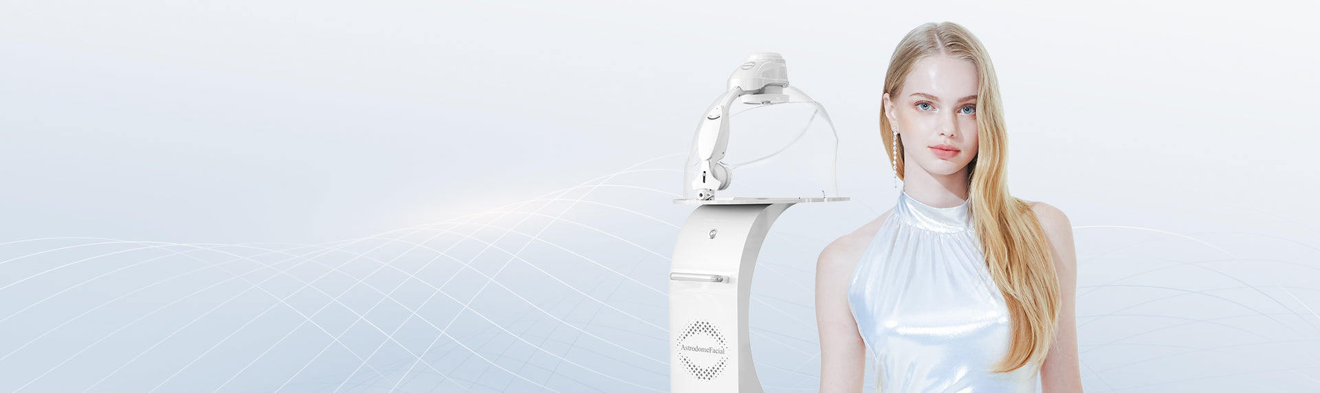  A model standing by the popular AstrodomeFacial LED Anion oxygen therapy aesthetic device by OxygenCeuticals.