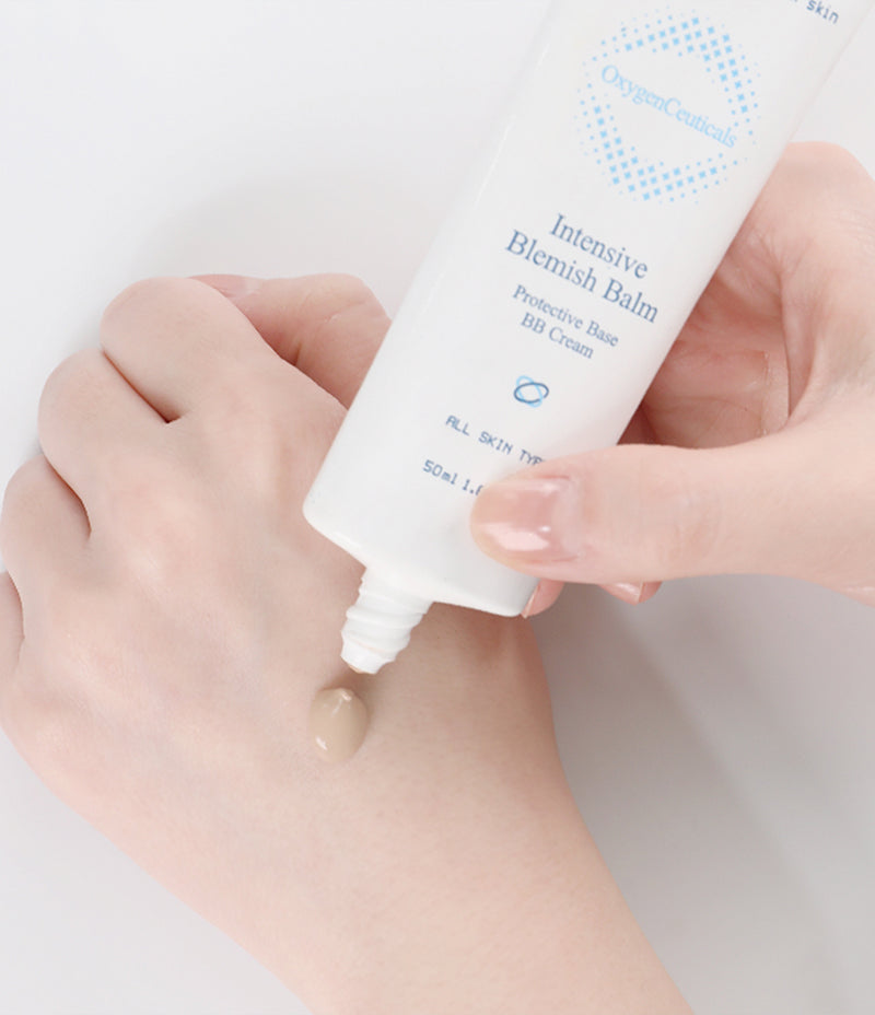  Person applying Intensive Blemish Balm to hand for fresh-fitting moisture cover.