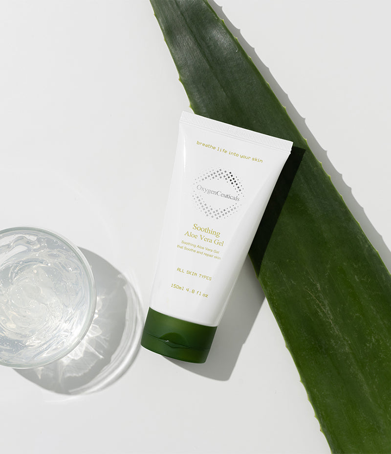 A bottle of Soothing Aloe Vera Gel for red, irritated skin, displayed next to a fresh aloe vera leaf.