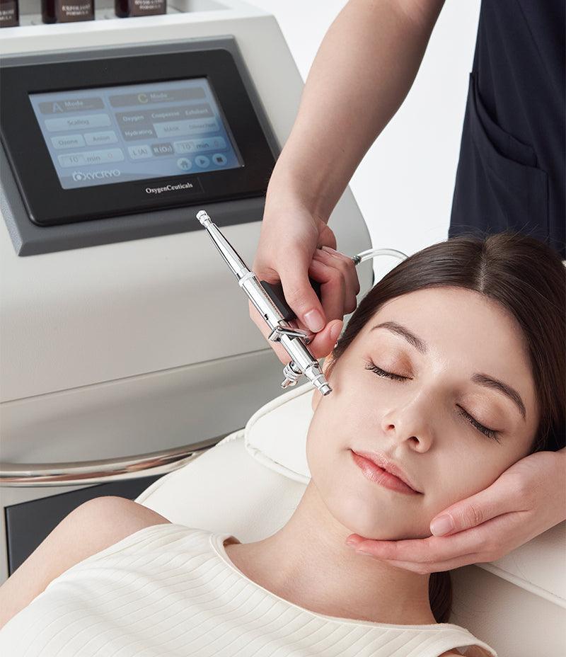  A woman receiving an OxyCryo scaling facial treatment, enhancing her skin's radiance and texture.