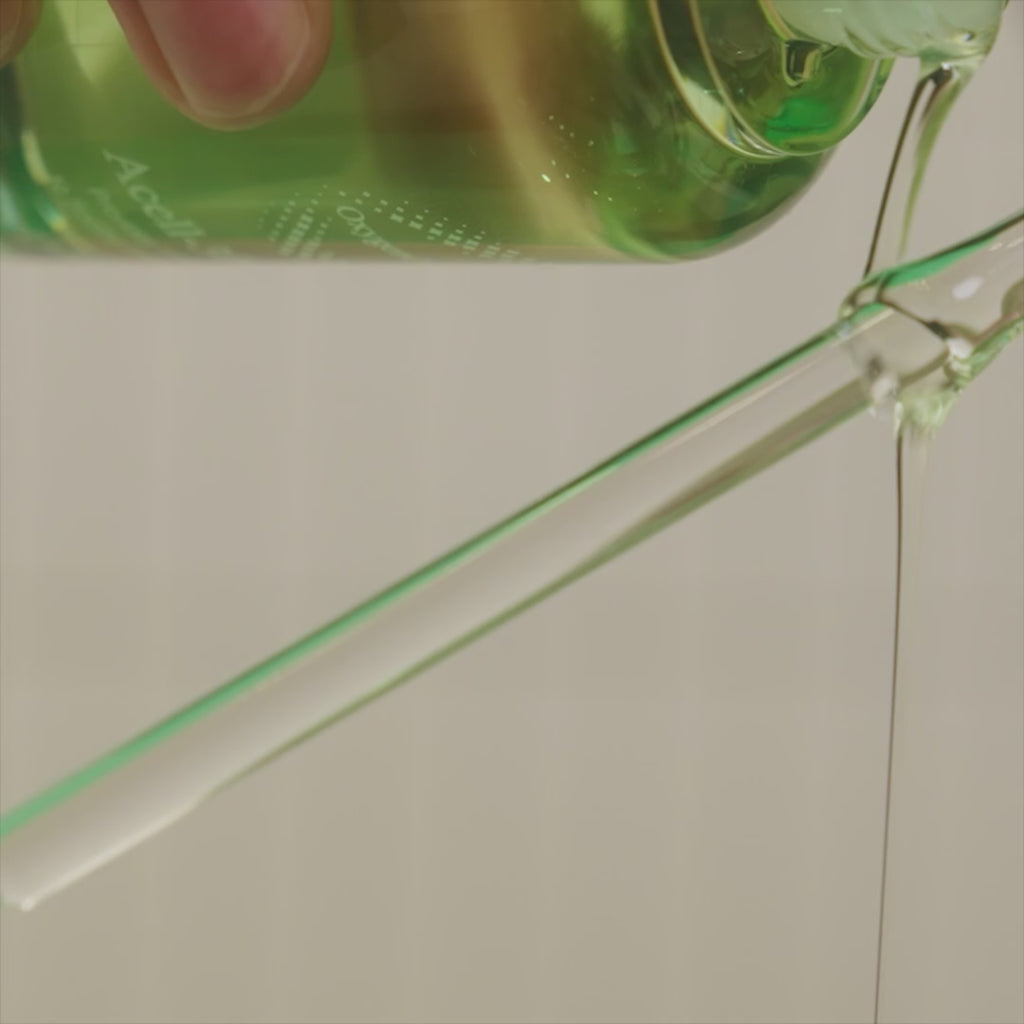 Brief video showing the rich, oil-like ampoule texture being poured onto a glass tube.